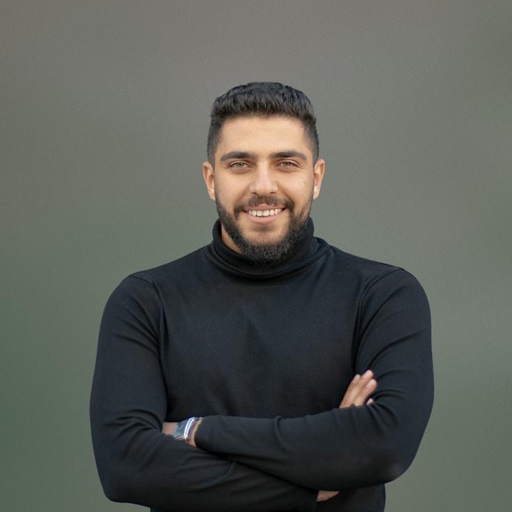 Alex Rivera, Lead Design Curator at Apex Grove Field, reviewing corporate floral arrangements